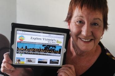 Pic of Councillor Helen Ballentine with an ipad