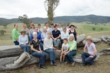 East Gippsland Women in Agriculture group sitting in country landscape