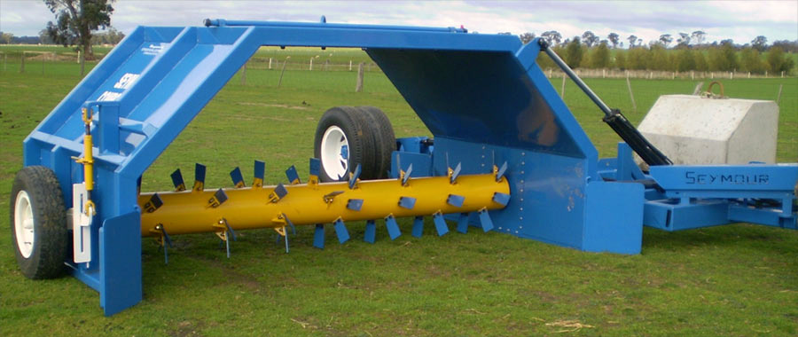 Photo of a PTO-driven windrow turner.