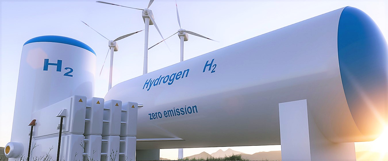 Large white hydrogen fuel tank with three wind turbines in background