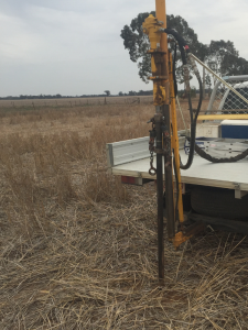 Soil corer mounted on ute, used to create soil cores for soil particle analysis.