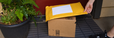 Packages delivered from online shopping and left by a front door