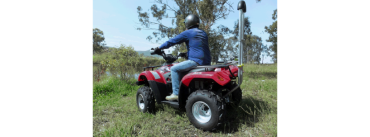 Quad bike with barrier